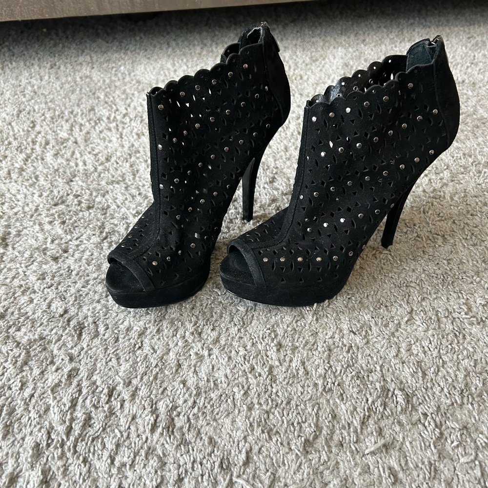 Studded Enzo Angiolini Platforms.